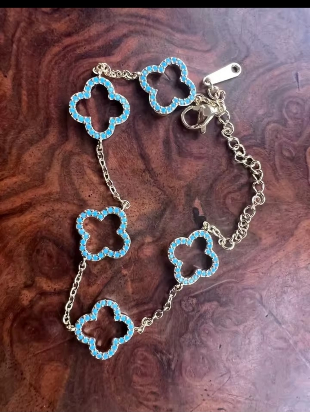 blue and gold clover bracelet